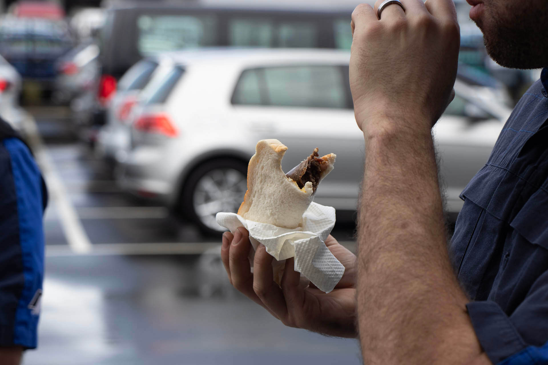 Fuelling the team - eating a sausage